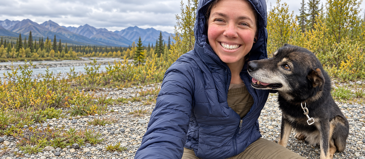 A dog and handler outdoors in Alaska
