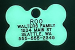 Glow-In-The-Dark Bone tag glowing in low light